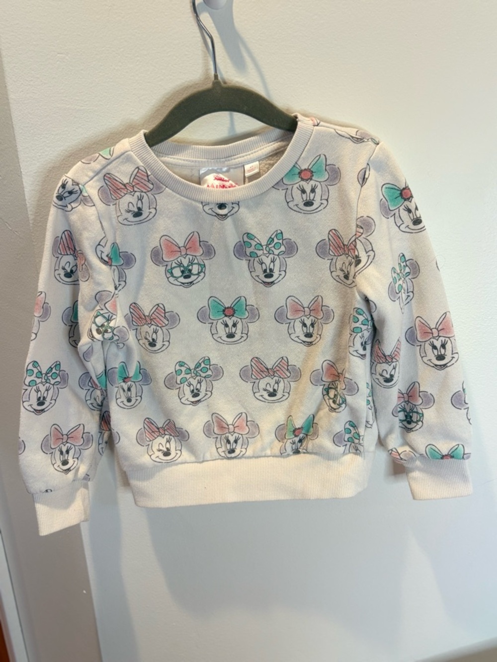 Disney Girls' Minnie Mouse Bow Sweatshirt - White with Pink & Teal Bows